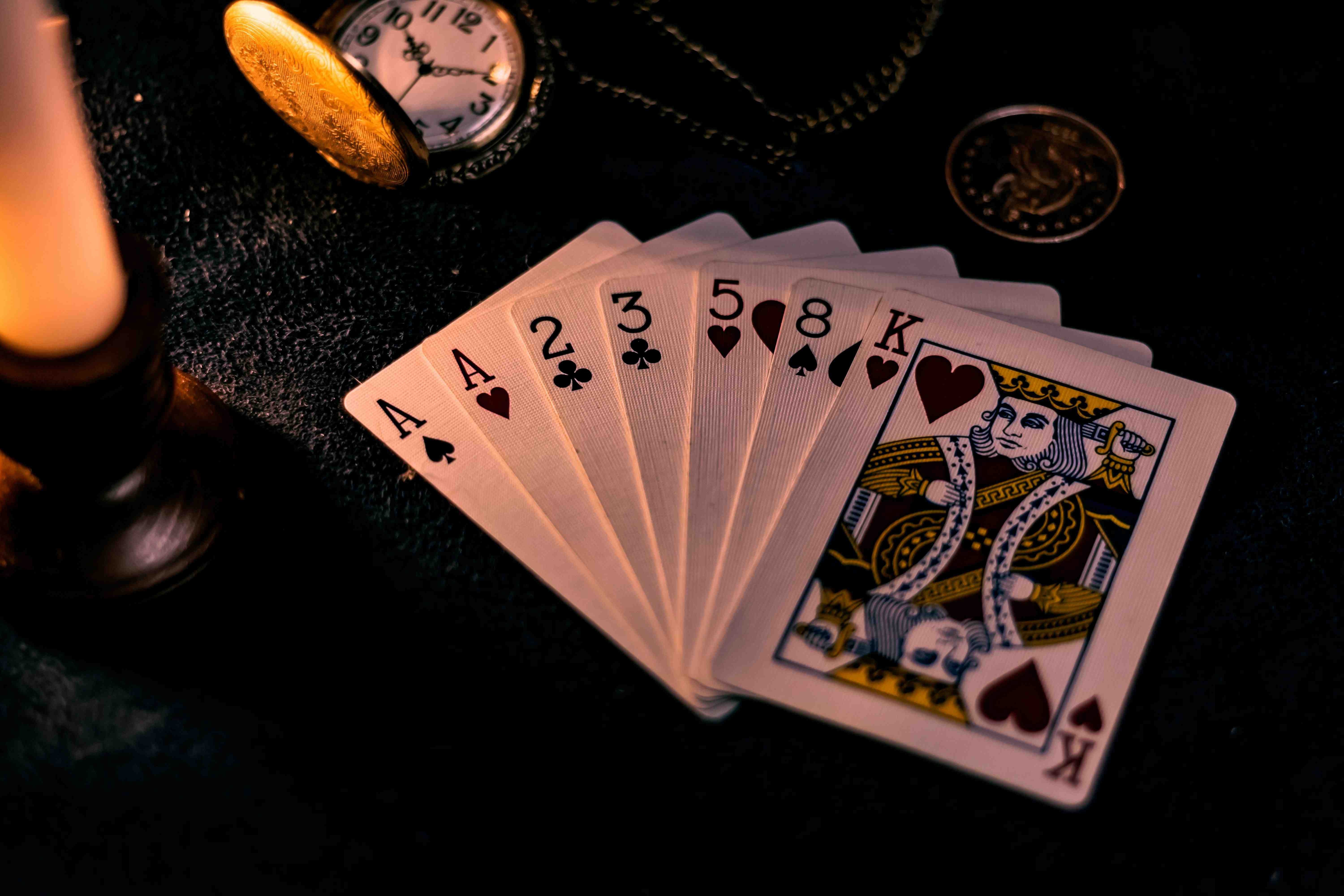 six game Live Casino dealer table streamed on a mobile phone screen